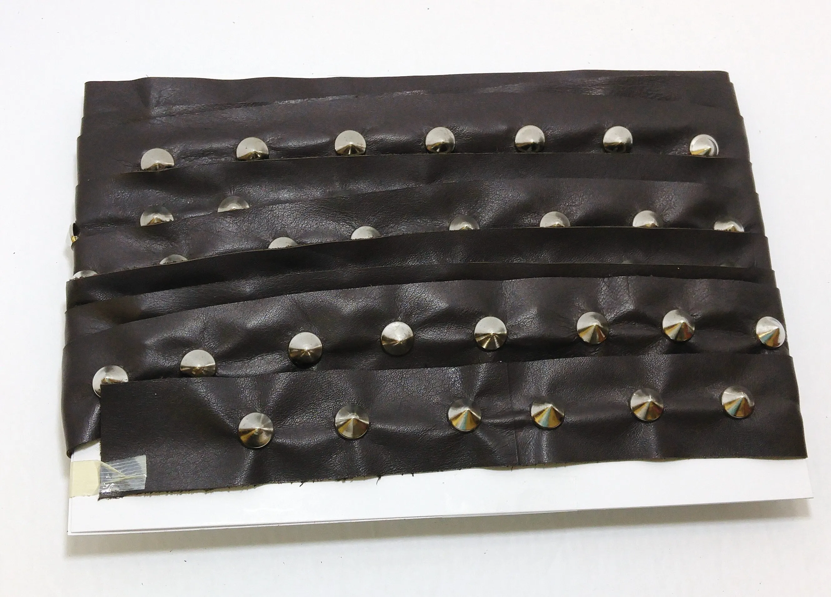 1 YD of 1-1/2" wide Genuine Cowhide Leather Trim Tape with Silver Cone-shaped Nailheads edge binding; top stitch; Medium Brown 3758XD9